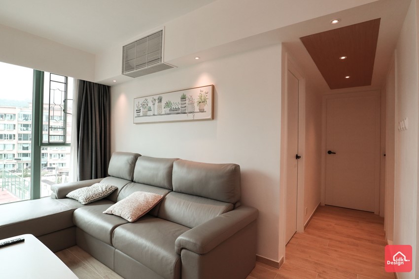 假天花把冷气机隐藏起来,拉直了客饭厅的墙壁,使整个空间更为工整.